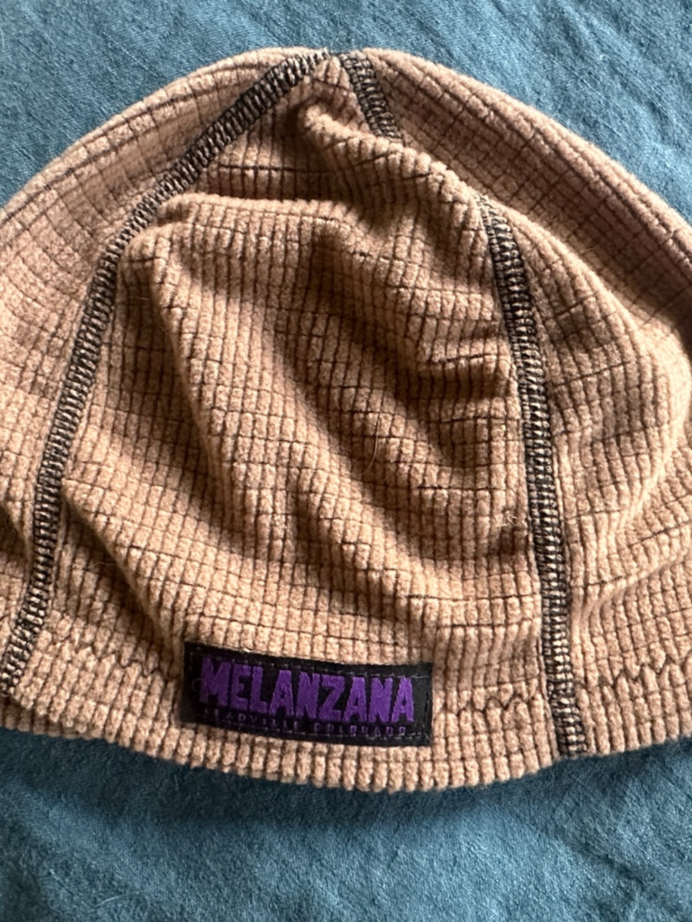NWOT Melanzana Tan Waffle Knit Beanie with Purple Logo